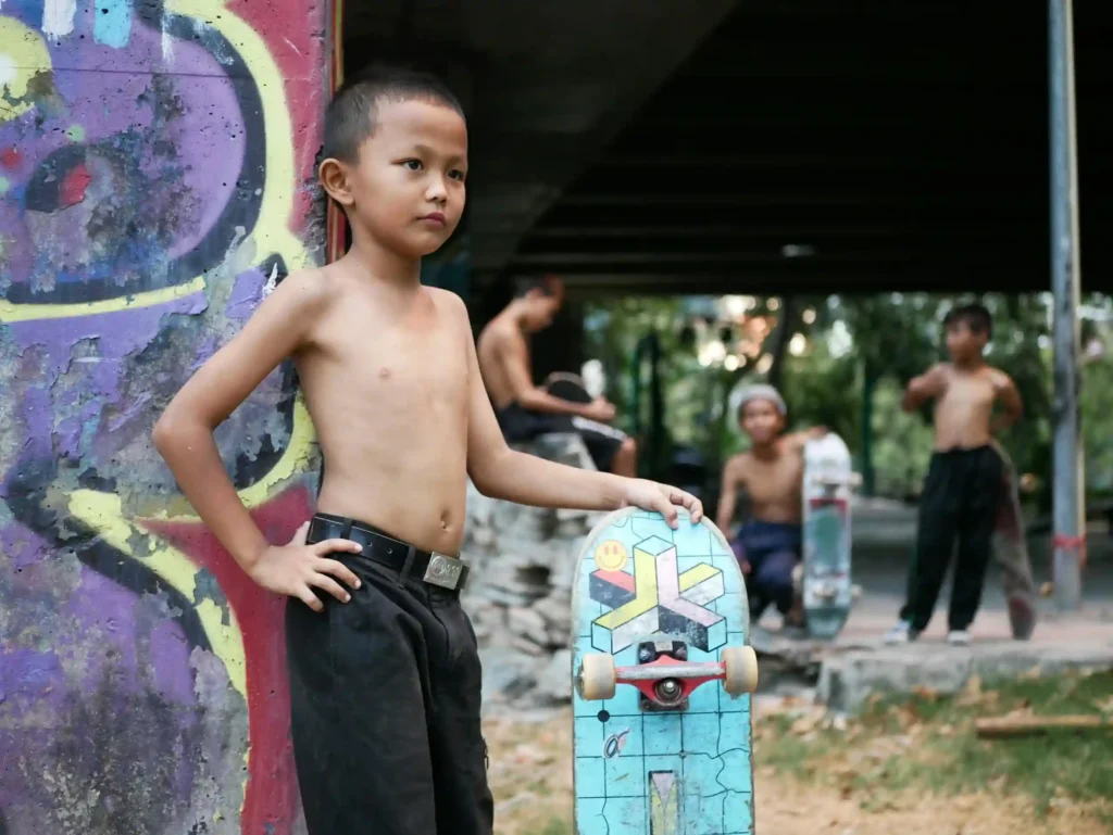 A diverse group of children playing outside in a green, safe, and healthy environment, highlighting the importance of environmental justice in child welfare.