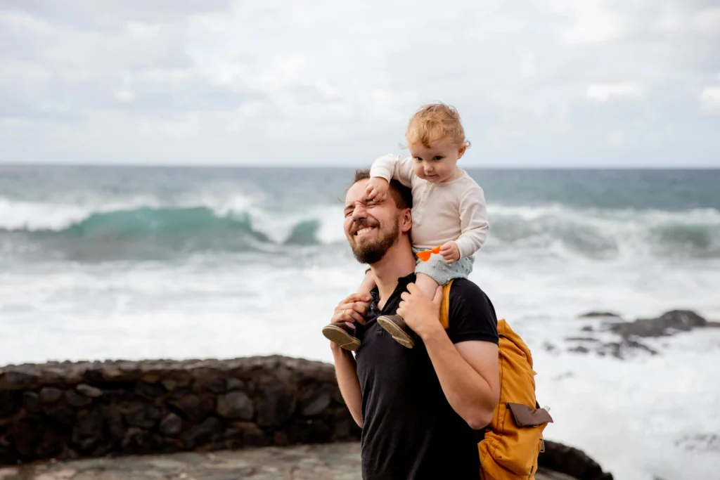  A dedicated custodial parent spending quality time with their child at home, ensuring a supportive and loving environment.